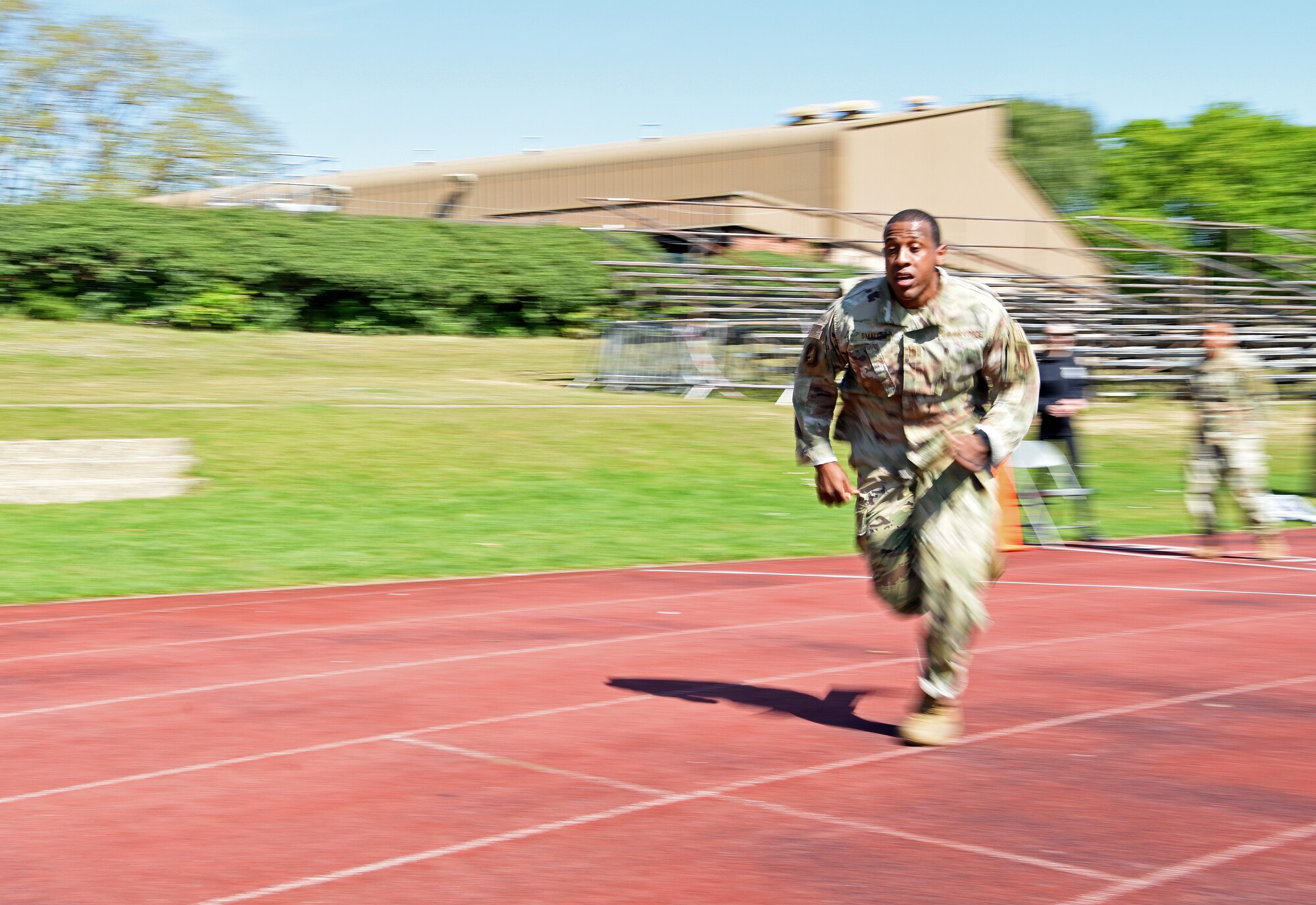 U.S. Air Force Chief Master Sgt. Micah Small, 100th Security Forces Squadron superintendent, sprints during the 48th Security Forces Squadron’s “Spartan Race,” which is a part of National Police Week at RAF Lakenheath, England, May 14, 2019. National Police Week is a chance for all law enforcement officials to pay respects to the officers who came before them, and also gives the base community the opportunity to support the force as well. (U.S. Air Force photo by Airman 1st Class Brandon Esau)