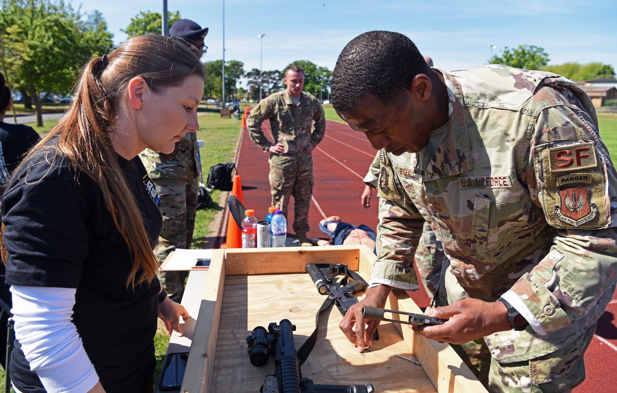 U.S. Air Force Chief Master Sgt. Micah Small, 100th Security Forces Squadron superintendent, assembles an M-4 during the 48th Security Forces Squadron’s “Spartan Race” at RAF Lakenheath, England, May 14, 2019. The “Spartan Race” is part of the week-long National Police Week recognition, in which both squadrons held events May 13-17. (U.S. Air Force photo by Airman 1st Class Brandon Esau)