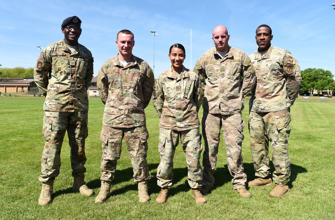 Defenders from the 100th Security Forces Squadron at RAF Mildenhall pose for a photo at RAF Lakenheath, England, May 14, 2019. The members competed in the 48th Security Forces Squadron’s “Spartan Race” as a part of National Police Week, which is a chance for all law enforcement officials to pay respects to the officers who came before them, and also gives the base community the opportunity to support the force as well. (U.S. Air Force photo by Airman 1st Class Brandon Esau)