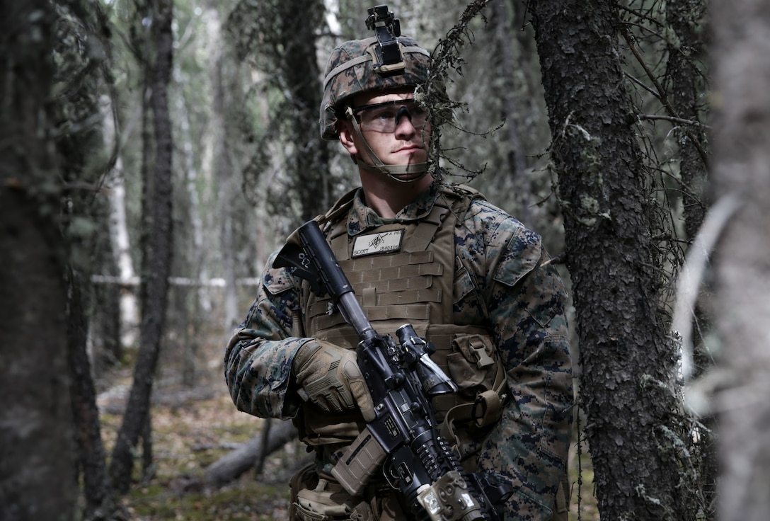 U.S. Marine Corps Cpl. Johnathan Scott, an infantry Marine with 2nd Battalion, 7th Marine Regiment, Special Purpose Marine Air Ground Task Force 7, conducts military operations on urbanized terrain training during exercise Northern Edge, May 13, 2019, at Fort Greely, Alaska. Approximately 10,000 U.S. military personnel will participate in exercise NE 2019, a joint training exercise hosted by U.S. Pacific Air Forces that prepares joint forces to respond to crises in the Indo-Pacific region.