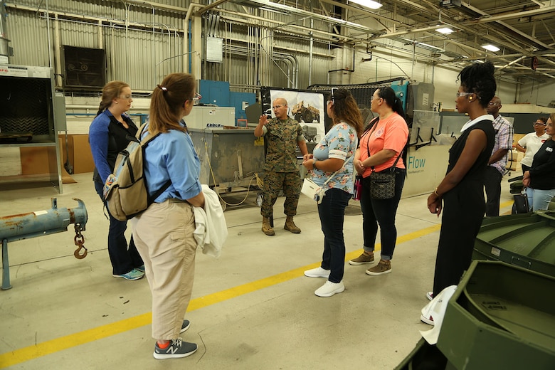 Several spouses participate in Marine Corps Logistics Command's first Mission Overview Course for Spouses at the Town and Country Ballroom aboard Marine Corps Logistics Base Albany, May 1. 

The course consisted of a command brief, team building activity and tours of Marine Depot Maintenance Command and Marine Force Storage Command.