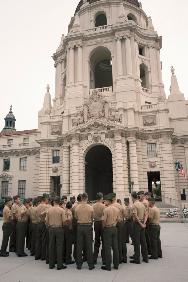 Marines with Headquarters and Service Company, 2nd Battalion, 23rd Marine Regiment, Marine Forces Reserve gather around Pasadena City Hall in Pasadena, Calif., May 10, 2019. The Reserve Marines are welcomed home after participating in a Unit Deployment Program to Okinawa, Japan, supporting various operations in the Indo-Asia-Pacific area of responsibility. (Marine Corps photo by Cpl. Daniel R. Betancourt Jr.)