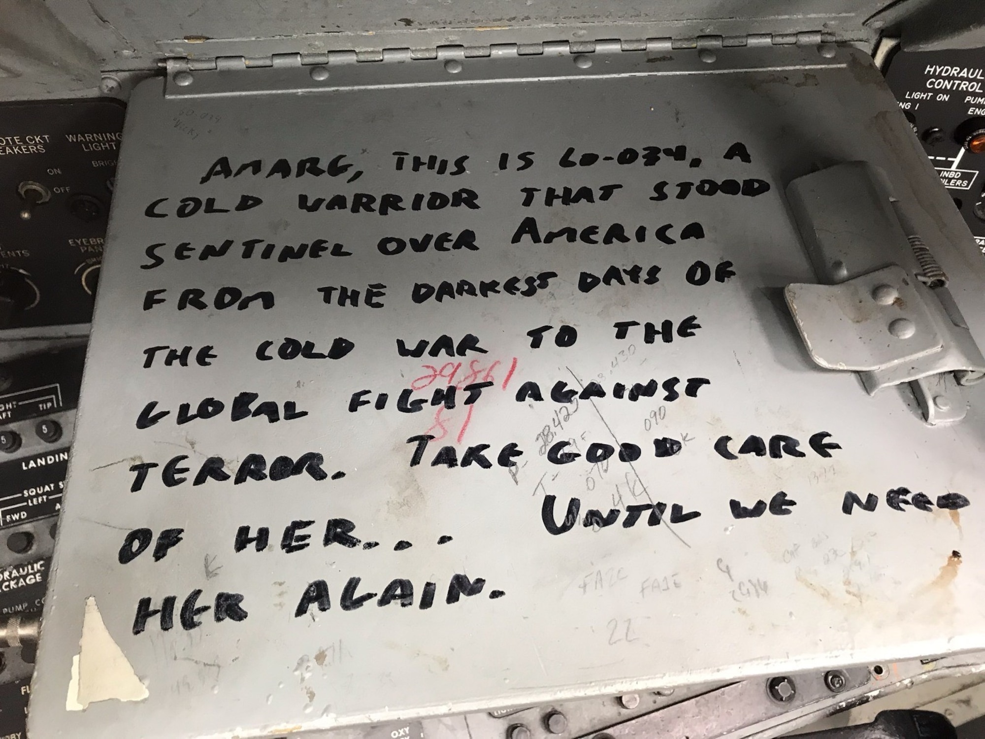 A note found inside the cockpit of Wise Guy, a B-52 Stratofortress, is displayed at Davis-Monthan Air Force Base, Arizona.  The jet has been a the 309th Aerospace Maintenance and Regeneration Group since 2008 and was recently flow out to be restored to active service. (courtesy photo)