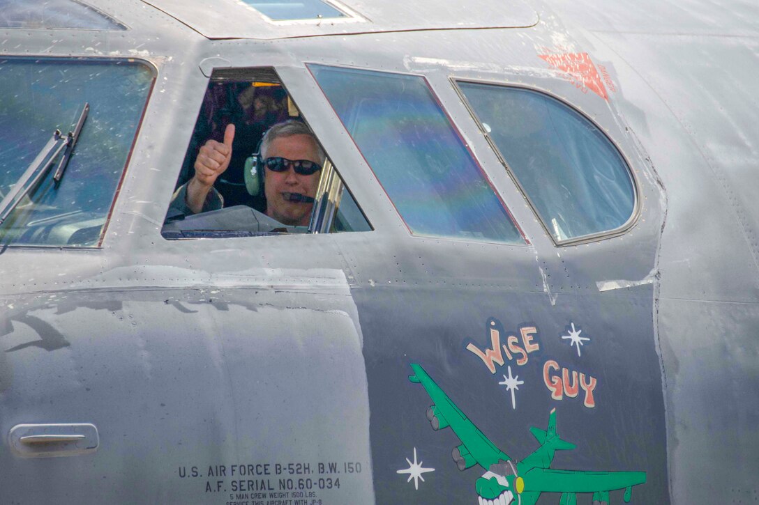 U.S. Air Force Col. Robert Burgess, 307th Operations Group commander, gives a thumbs up after flying a B-52 Stratofortress, nicknamed "Wise Guy," to Barksdale Air Force Base, Louisiana, May 14, 2019.  The bomber had been at the 309th Aerospace Maintenance and Regeneration Group at Davis-Monthan AFB, Arizona since 2008.  It took a team of Reserve Citizen Airmen and their active duty counterparts four months to prepare "Wise Guy" for flight after its decade long hiatus at AMARG. (U.S. Air Force photo by Master Sgt. Ted Daigle)