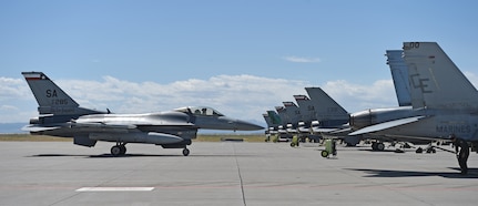 An F-16 Fighting Falcon, assigned to the Air National Guard’s 149th Fighter Wing, headquartered at Joint Base San Antonio-Lackland, returns from a training mission April 29 during Coronet Bronco at Mountain Home Air Force Base, Idaho. The exercise is a capstone event for the student fighter pilots and evaluates their knowledge and skills before they graduate and proceed to the next phase of their training. The exercise also incorporates many of the home unit’s support personnel, which includes members from maintenance, weapons, logistics, communication, finance and other various other shops.