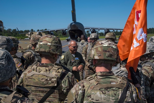 U. S. Air Force Tech. Sgt. Albert Pempsell, loadmaster with the 300th Airlift Squadron Joint Base Charleston, S.C., briefs Soldiers from the 414th Signal Company, Fort Stewart, Georgia, May 14, 2019, at Wright Army Airfield. The Airforce and the Army participated in an Expeditionary Deployment Readiness Exercise to help bolster combat readiness. (U.S. Air Force photo by Senior Airman William Brugge)