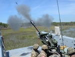 Virginia National Guard Soldiers assigned to the Norfolk-based 1st Battalion, 111th Field Artillery Regiment, 116th Infantry Brigade Combat Team conduct waterborne artillery live fire exercises during Operation GATOR April 24-25, 2019, at Camp Lejeune, North Carolina.