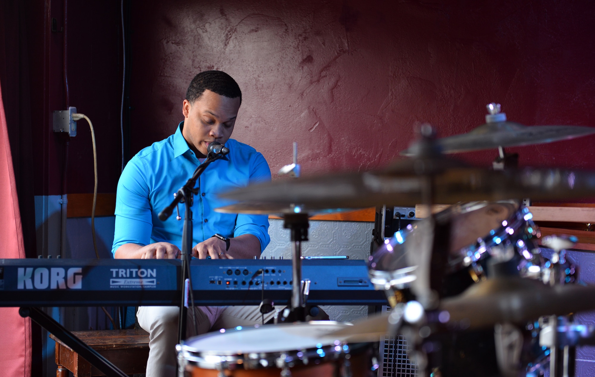 Airman 1st Class Mario Foreman-Powell, a vocalist with the United States Air Force Heartland of America Band, sings his song ‘Sometimes’ in front of a panel of judges at the Omaha Performing Arts Singer-Songwriter Competition held at the B Side Theatre, Nebraska, May 6, 2019. Airman Foreman-Powell won first place and will perform at the MAHA Music Festival on August 17, 2019. (U.S. Air Force photo by Josh Plueger)