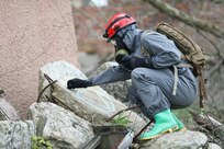 A U.S. Army Soldier of the 2nd Platoon, 68th Engineer Construction Co., based in Fort Hood, Tex., conducts simulated, urban search and rescue operations in an area with a chemical, biological, radiological or nuclear contamination in Muscatacuck Urban Training Center, Ind., May 4, 2019. Guardian Response 19 is a joint, multi-component training exercise controlled by the U.S. Army Reserve 78th Training Division and includes more than 9,000 service members from across the country. The exercise tests the ability of the U.S. military to respond to a chemical, biological, radiological, or nuclear catastrophe as part of the Defense Support of Civil Authorities (DSCA) program. Under the DSCA program, the Department of Defense provides essential support to civil authorities for domestic emergencies. (U.S. Army Reserve Photo by Sgt. Phillip Scaringi/released)