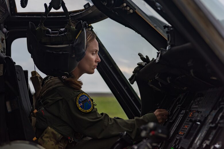U.S. Air Force Maj. Margaret McCord, 33rd Rescue Squadron flight lead, performs avionics system checks on an HH-60G Pave Hawk May 8, 2019, on Kadena Air Base, Japan.
