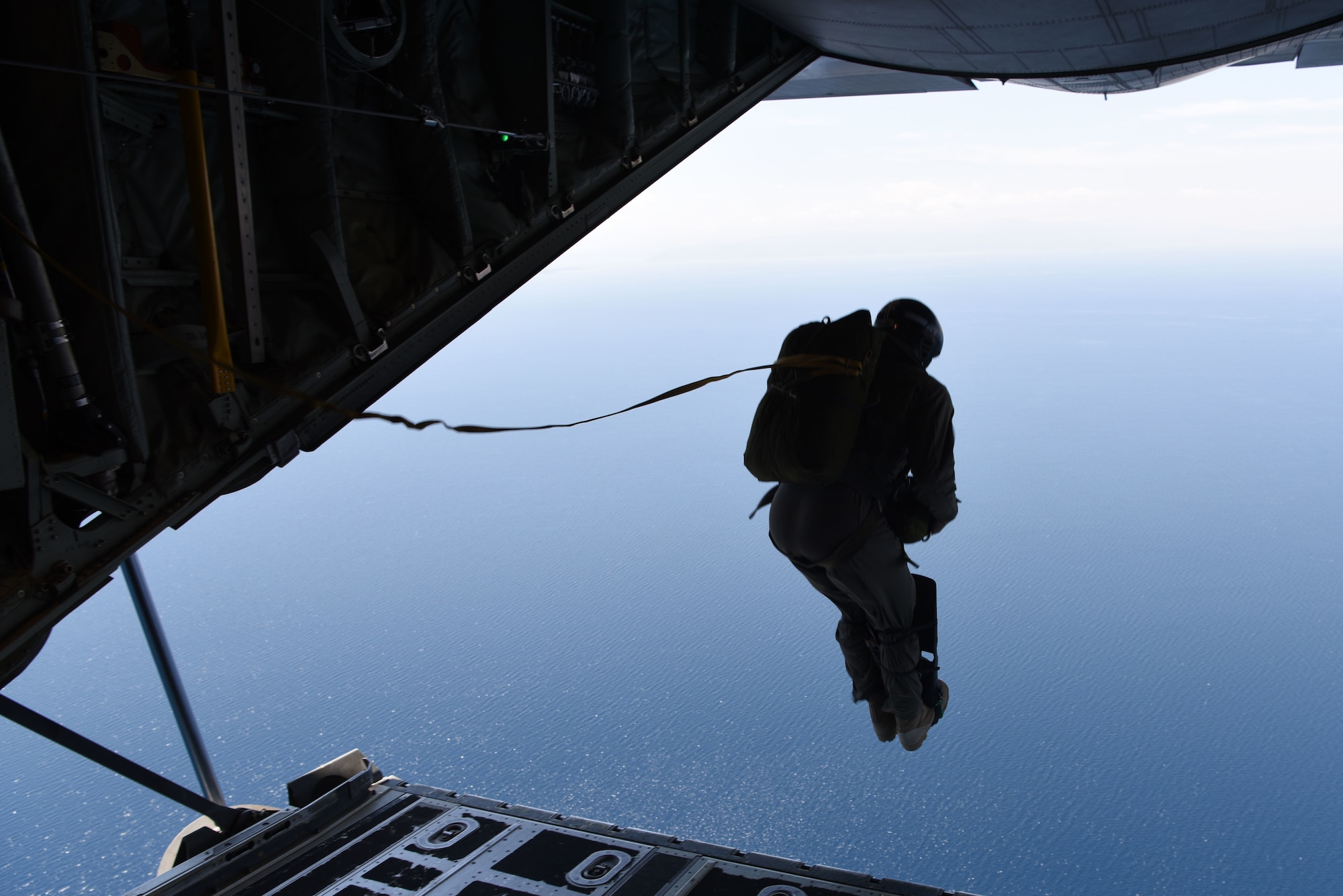 A Hellenic Navy seaman jumps out of a U.S. Air Force C-130J Super Hercules into the Aegean Sea, during exercise Stolen Cerberus VI, May 9, 2019, off the coast of Greece. Stolen Cerberus is an annual bilateral training event with the Hellenic air force designed to enhance interoperability and airlift capabilities through realistic joint air operations training, including aeromedical evacuation operations and airlift and airdrop capabilities.
