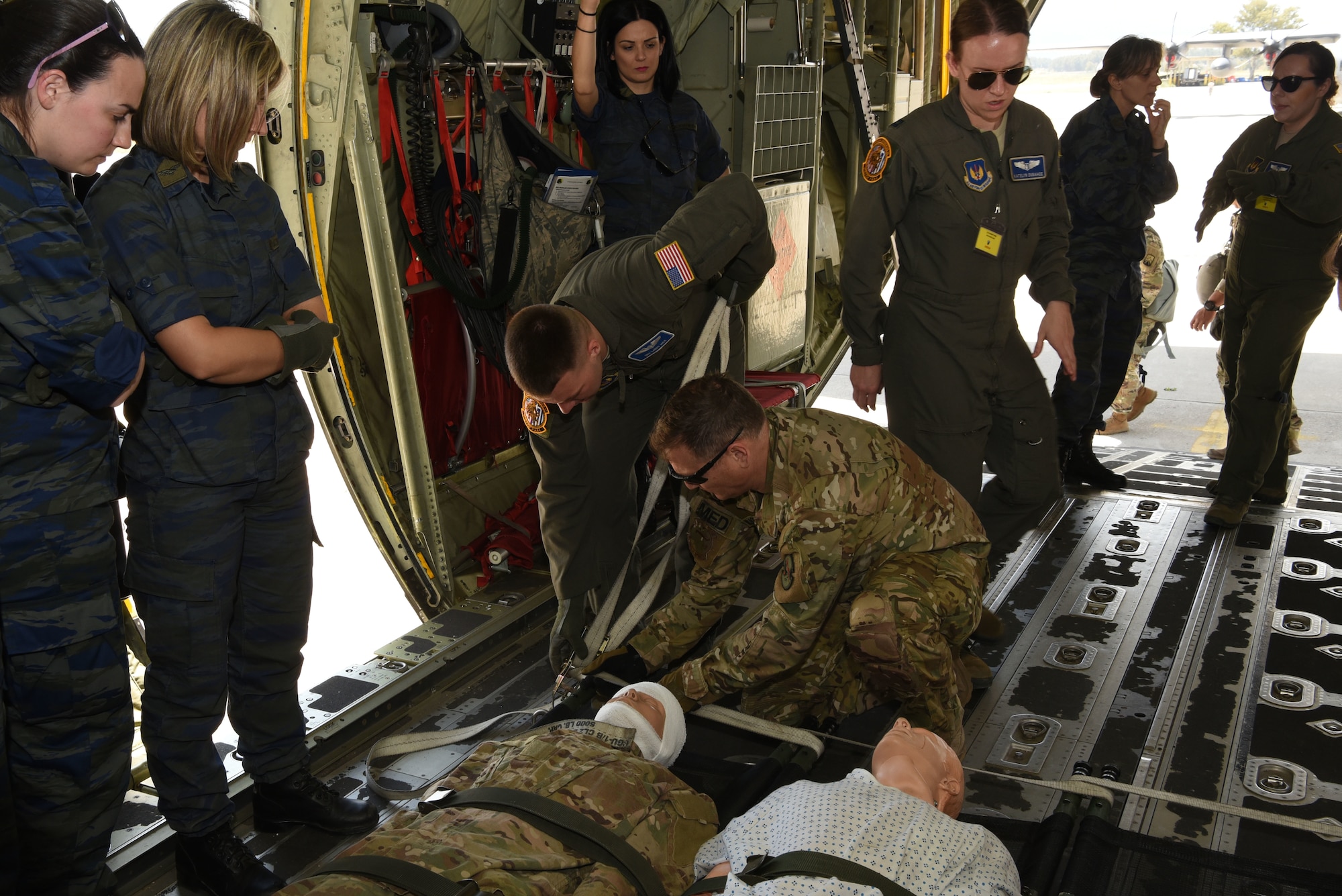 Airmen from the 86th Aeromedical Evacuation Squadron, Ramstein Air Base, Germany, conduct combat medical training with medical personnel from the Hellenic military, during exercise Stolen Cerberus VI, May 10, 2019, on Elefsis Air Base, Greece. Stolen Cerberus is an annual bilateral training event with the Hellenic air force designed to enhance interoperability and airlift capabilities through realistic joint air operations training, including aeromedical evacuation operations and airlift and airdrop capabilities.