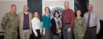 USFFC Staff pose for a group photo after receiving a 2019 Secretary of the Navy Environmental Award for environmental planning of the AFTT Study Area Phase III Environmental Impact Statement.