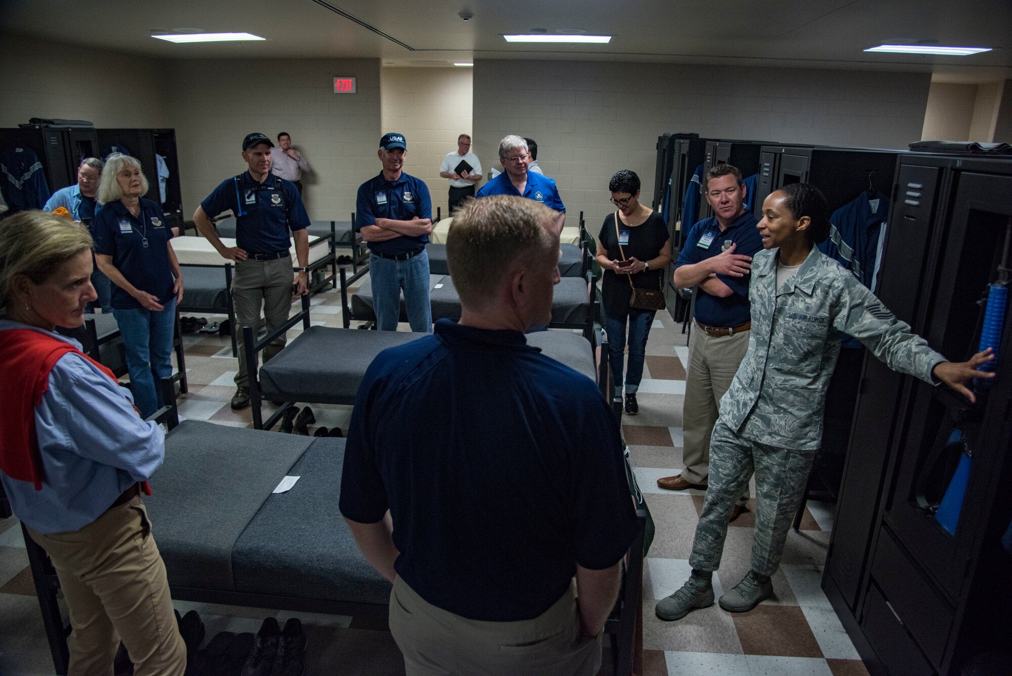Air Mobility Command civic leaders observe the dormitories of basic training, Joint Base San Antonio-Lackland, Texas, May 2, 2019.  The civic leaders toured the 37th Training Wing, also known as the “Gateway Wing,” as guests of AMC Cmmander Gen. Maryanne Miller. (U.S. Air Force photo by Traci Howells)