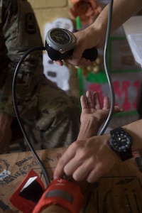 A U.S. Army nurse assigned to Joint Task Force – Bravo Medical Element, takes the blood pressure of a Honduran patient during a Medical Readiness Training Exercise (MEDRETE), May 10, 2019, in El Paraiso, Honduras. Members of JTF-B partnered with the Honduran Military and Ministry of Health to provide health care services for more than 1,300 Honduran citizens; reaching a third of the citizens in the towns of Argelia, Santa Maria and Las Dificultades in the El Paraiso Department. The goal of the mission was to provide the medical staff training in their areas of expertise as well as strengthen partnerships with the Honduran allies. (U.S. Air Force photo by Staff Sgt. Eric Summers Jr.)