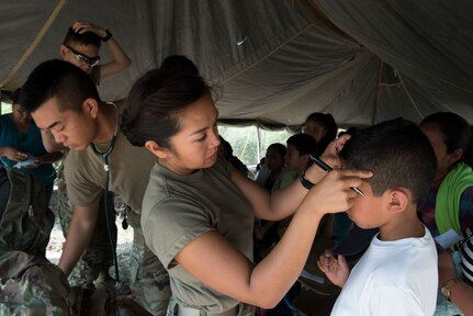 U.S. Army Capt. Allyssa Montemayor, Joint Task Force – Bravo Medical Element registered nurse, takes the temperature of a patient during a Medical Civil Action Program (MEDCAP), May 11, 2019, in El Paraiso, Honduras. Members of JTF-B partnered with the Honduran Military and Ministry of Health to provide health care services for more than 1,300 Honduran citizens; reaching a third of the citizens in the towns of Argelia, Santa Maria and Las Dificultades in the El Paraiso Department. The goal of the mission was to provide the medical staff training in their areas of expertise as well as strengthen partnerships with the Honduran allies. (U.S. Air Force photo by Staff Sgt. Eric Summers Jr.)