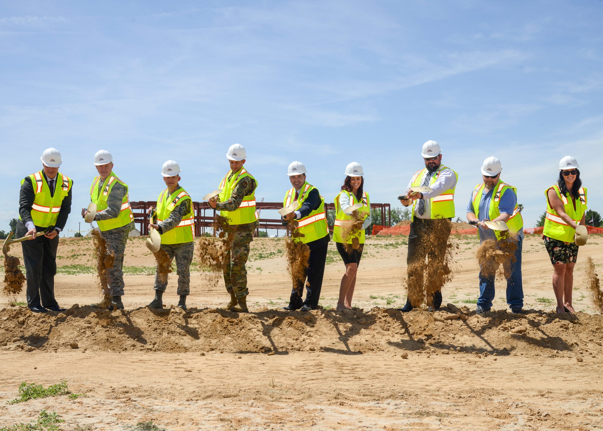 Kevin Cordes, Kevin Cordes, Muroc Joint Unified School District Superintendent, center, is joined by base and local civic leadership during a ground breaking ceremony for Branch and Bailey Elementary Schools on Edwards Air Force Base, Calif., May 13. (U.S. Air Force photo by Giancarlo Casem)