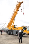 Functions of Puget Sound Naval Shipyard & Intermediate Maintenance Facility’s newest mobile crane are demonstrated moments after a ribbon-cutting ceremony May 2