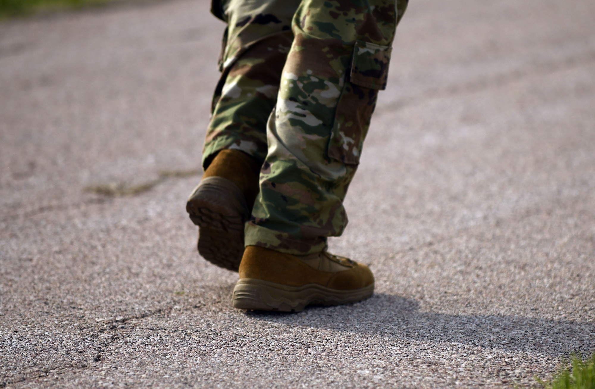 An Airman runs 4.5 miles along Heritage Lake as part of the Police Week Ruck Challenge at Ellsworth Air Force Base, S.D., May 13, 2019. The ruck challenge was organized by the 28th Security Forces Squadron in recognition of National Police Week, an observance that was designated by former President John F. Kennedy in 1962. (U.S. Air Force photo by Airman 1st Class Christina Bennett)