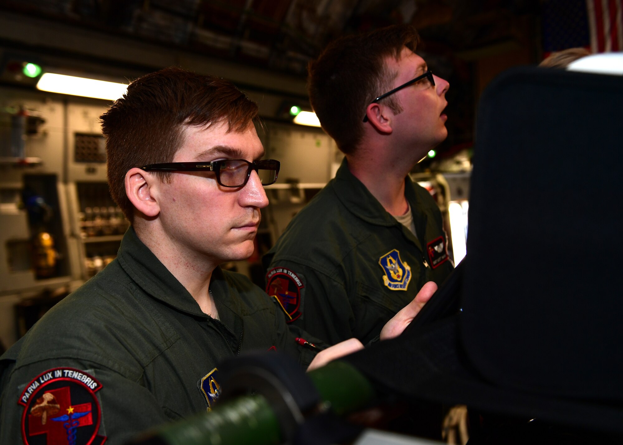 Staff Sgts. John Klobushnik and Scott Wardo, 914th Aeromedical Evacuation Squadron medical technicians, check equipment at Barbers Point Airfield, Hawaii April 24, 2019. The 914th AES is from Niagara Falls, New York and came to Hawaii to train with the 911th Airlift Wing’s C-17 Globemaster III and visit with other aeromedical evacuation squadrons. (U.S. Air Force photo by Senior Airman Grace Thomson)