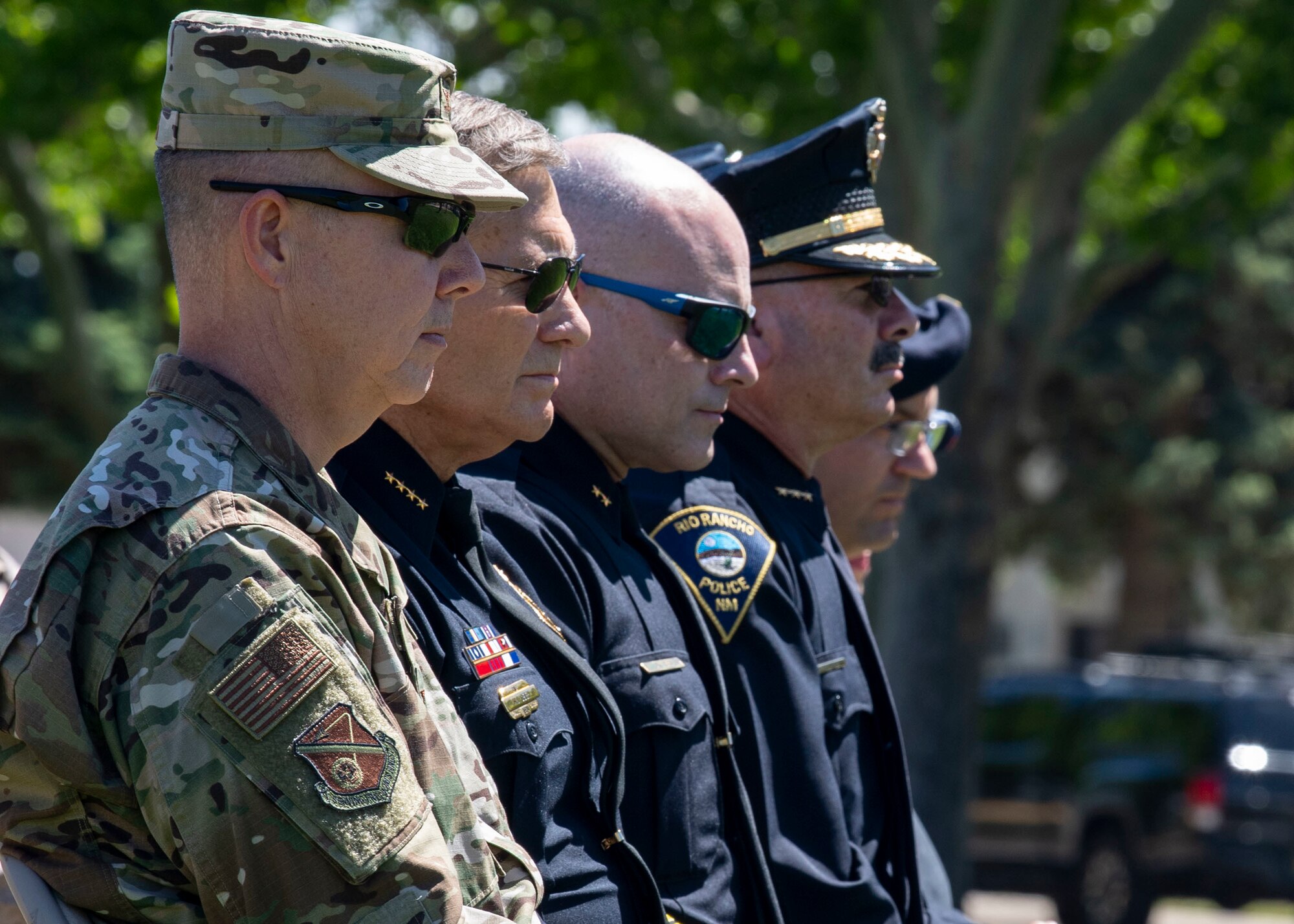 377th Air Base Wing commander, Col. Richard Gibbs sits with New Mexico law enforcement leadership during the Police Week Memorial Retreat Ceremony at Kirtland Air Force Base, N.M., May 15. National Police Week is an annual nationwide tribute to law enforcement officers who have lost their lives in the line of duty for the safety and protection of others. National Police Week started Sunday, May 12, and ends Saturday, May 18. (U.S. Air Force photo by Staff Sgt. J.D. Strong II)