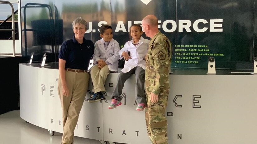 JoJo the Scientist and his sister, Grace, chat with Secretary of the Air Force Heather Wilson (left), and Air Force Vice Chief of Staff Stephen W. Wilson (right) at the Legends in Flight Joint Base Andrews Air & Space Expo 2019, at JB Andrews, Md., May 10, 2019. JoJo and approximately 7,000 other students were immersed in hands-on science, technology, engineering and mathematics activities among some 30 exhibits.