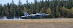 An EA-18G Growler assigned to VAQ 131 lands during a FCLP at an outlying landing field attached to Naval Air Station Whidbey Island.