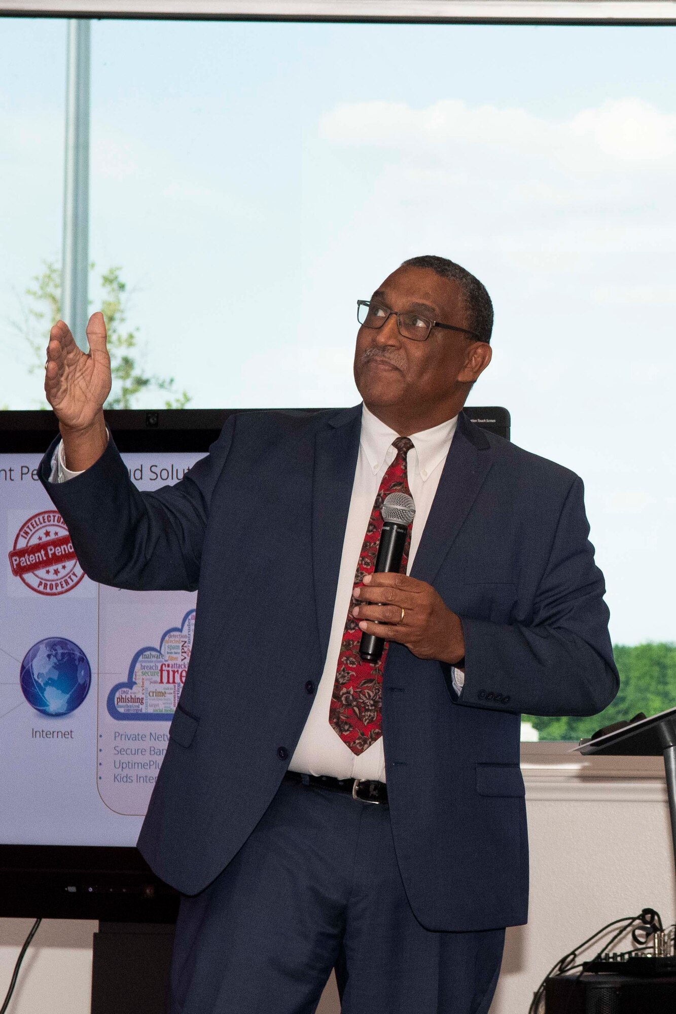 Hilton Nicholson with CyberReef Solutions, explains the military applications of his company during the inaugural Air Show Innovation Showcase at Bossier Parish Community College, Bossier City, Louisiana, May 14, 2019.   CyberReef was one of several regional companies offering solutions to problems facing both the civilian and military communities. The event was sponsored by the 307th Bomb wing, the Entrepreneurial Accelerator Program, Bossier Parish Community College and Building the Region's Future. (U.S. Air Force photo by Master Sgt. Ted Daigle)