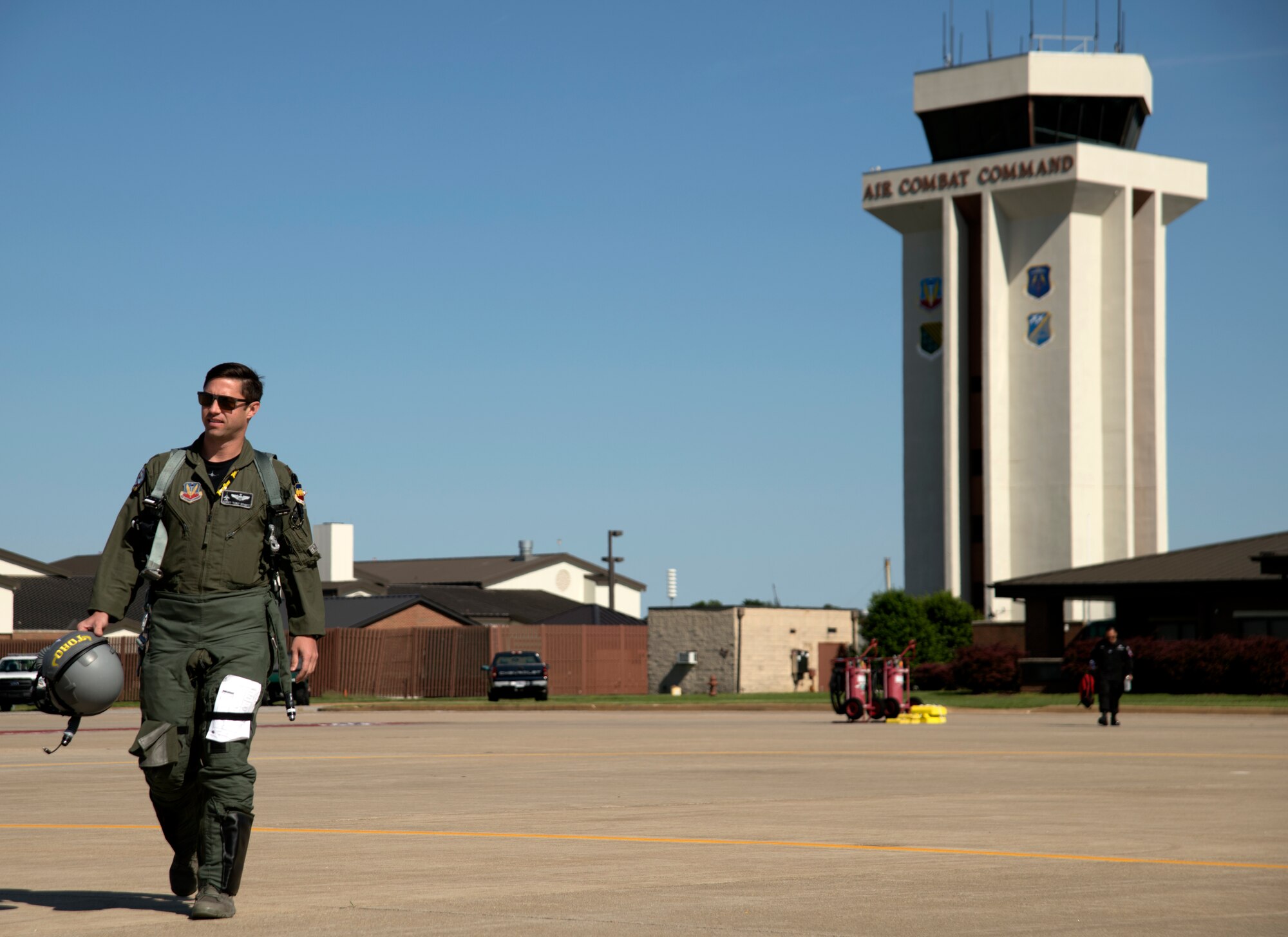 U.S. Air Force Maj. Garret “Toro” Schmitz, F-16 Viper Demonstration Team commander and pilot, walks to his F-16CM Viper on the flight line at Joint Base Langley-Eustis, Va., May 15, 2019.