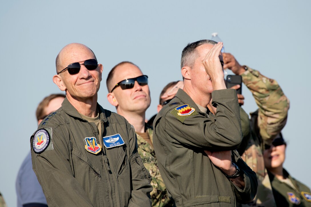 U.S. Air Force Air Combat Command leaders watch as Maj. Garret “Toro” Schmitz, F-16 Viper Demonstration Team commander and pilot, performs a demonstration at Joint Base Langley-Eustis, Va., May 16, 2019.
