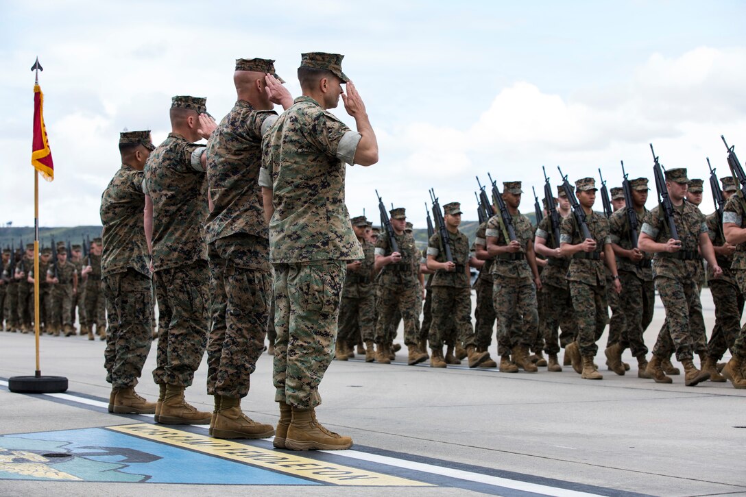 Prior sergeants major of Marine Light Attack Helicopter Squadron (HMLA) 369 stand with U.S. Marine Corps Sgt. Maj. Carey R. Wells, new sergeant major of HMLA-369, during the pass in review of a relief and appointment ceremony for HMLA-369 on Marine Corps Air Station Camp Pendleton, Calif., May 10, 2019. The ceremony formally recognized Sgt. Maj. Michael R. Buckles for his honorable service and dedication to the Corps and welcomed Wells as HMLA-369’s new sergeant major. (U.S. Marine Corps photo by Lance Cpl. Levi J. Guerra)