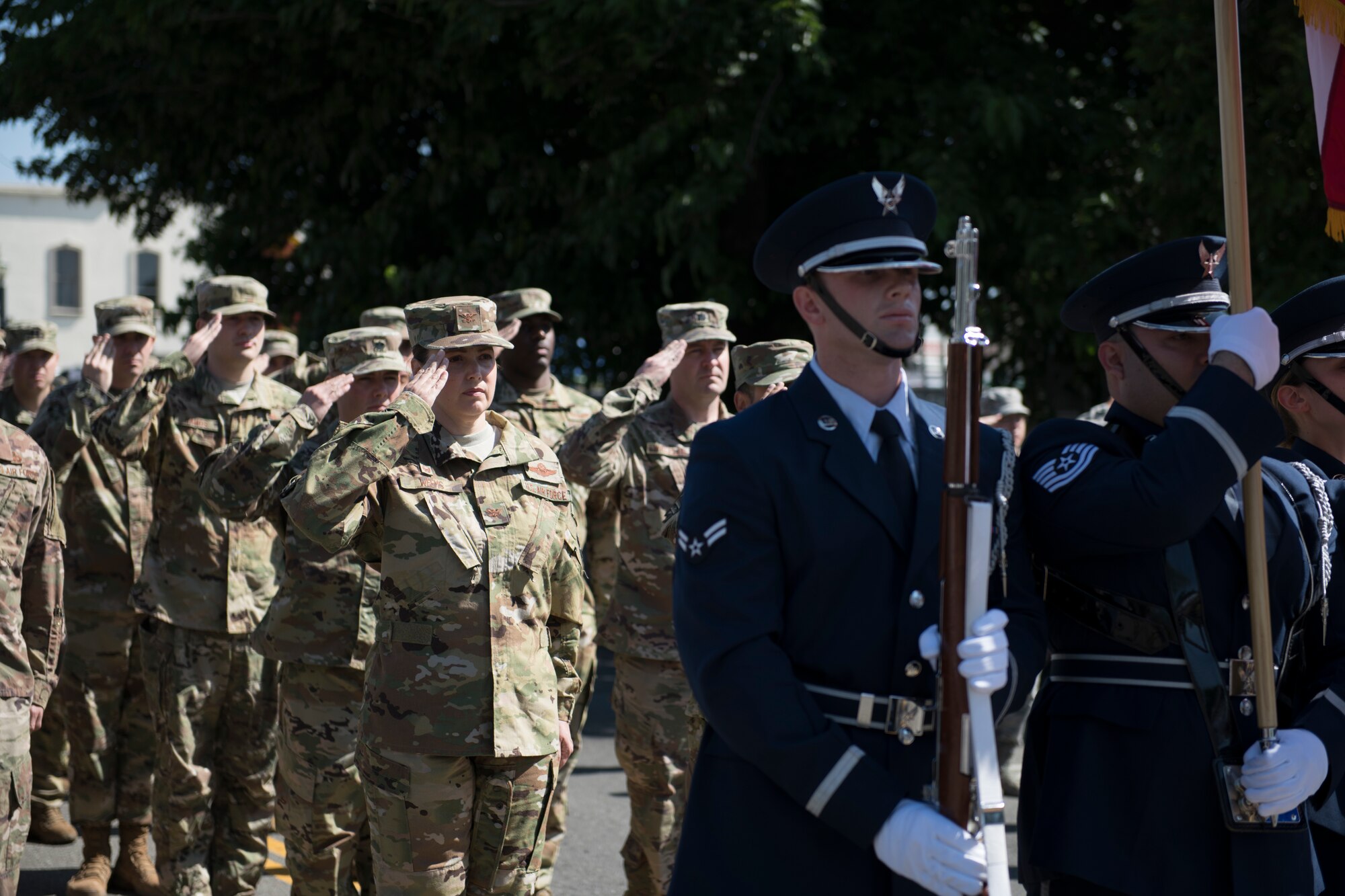 U.S. Air Force Airmen assigned to the 60th Air Mobility Wing march in the annual Dixon May Fair Parade in Dixon, California, May 11, 2019. The Airmen from the 60th Operations Group and the Wing Staff Agency marched in the parade to promote community engagement and build strong partnerships. (U.S. Air Force photo by Airman 1st Class Amy Younger)
