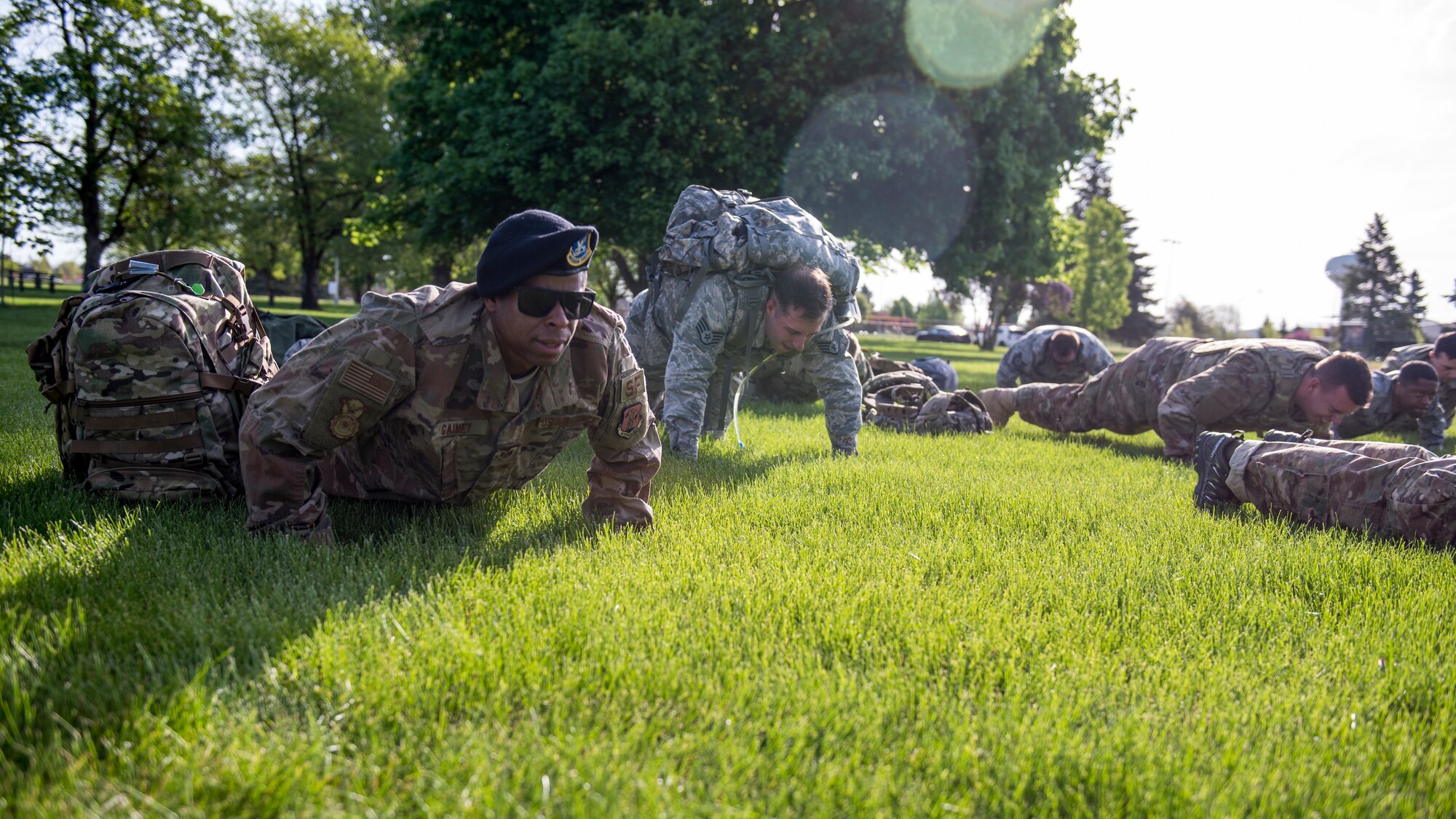 U.S. Air Force Staff Sgt. Kenny Gainey, 141st Security Forces readiness trainer, executes push-ups in honor of each defender who has lost their life in the line of duty since 9/11, during National Police Week at Fairchild Air Force Base, Washington, May 13, 2019. The 92nd SFS hosted numerous events for Team Fairchild to enjoy, including a Ruck and Run, a Memorial Retreat Ceremony and a kid-friendly Law Enforcement Exposition. (U.S. Air Force photo by Airman 1st Class Whitney Laine)