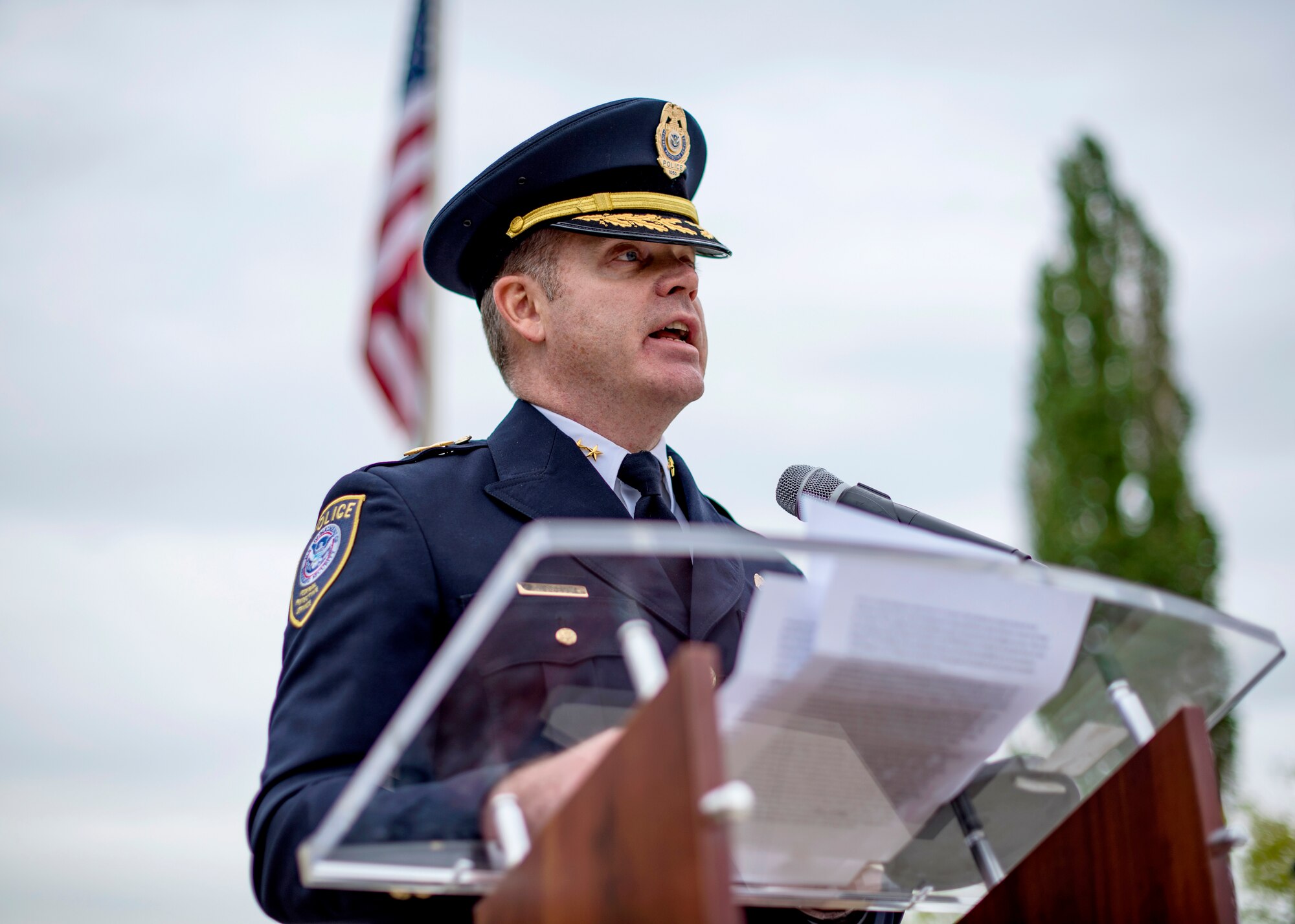 Gabriel Russell, Pacific Northwest Arctic Region Federal Protective Service regional director, speaks about the importance of Police Week during a National Police Week Memorial Retreat Ceremony at Fairchild Air Force Base, Washington, May 15, 2019. Police Week is a chance for all law enforcement officials and affiliating agencies to pay respects to the officers that came before them. (U.S. Air Force photo by Airman 1st Class Whitney Laine)
