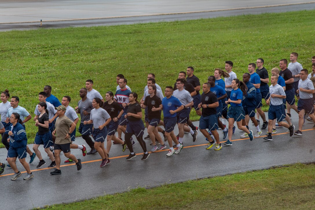 U.S. Air Force Airmen participate in the Port Dawg Memorial Run at Kadena Air Base, Japan, May 16, 2019.