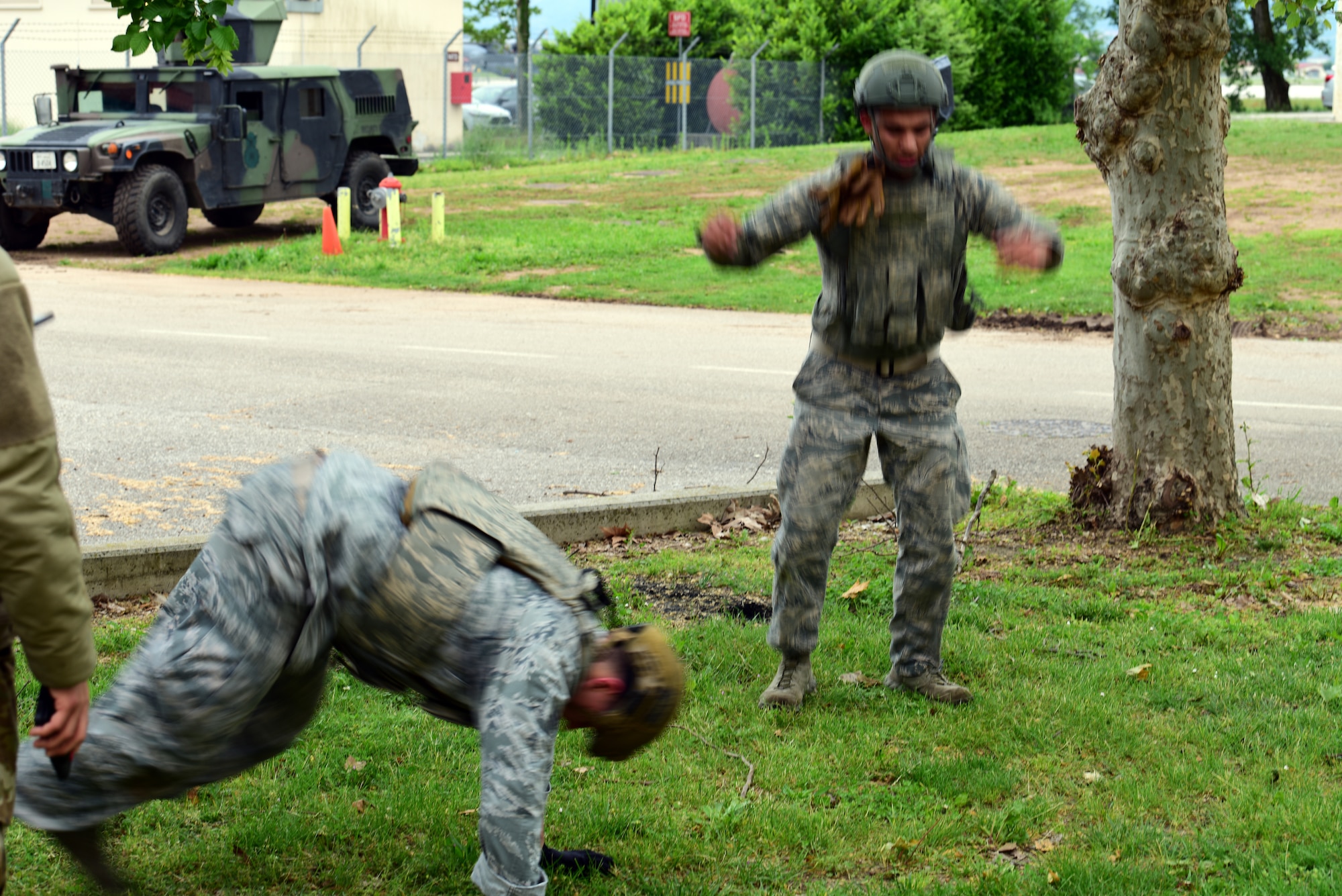 Participants were required to do burpees for each answer they got wrong during a quiz while taking part in the Police Week Combat Challenge that pit security forces Airmen against Joint International Non Commissioned Officers Development Course on May 15, 2019 at Aviano Air Base, Italy. A burpee is a four-count full body exercise. (U.S. Air Force photo by Airman 1st Class Caleb House)