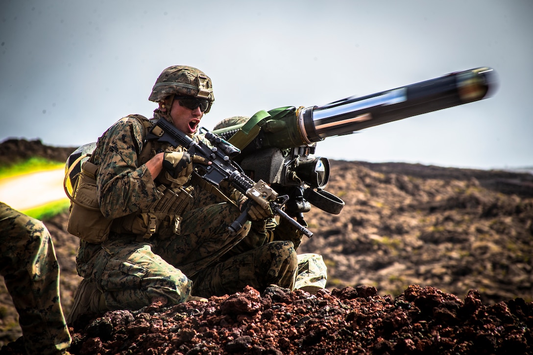 U.S. Marine Corps Sgt. Troy Mole, section leader, Combined Anti-Armor Team, Weapons Company, 2nd Battalion, 3rd Marine Regiment, fires a shoulder-fired Javelin missile during Exercise Bougainville II on Range 20A, Pohakuloa Training Area, Hawaii, May 15, 2019. Bougainville II is the second phase of pre-deployment training conducted by the battalion in order to enhance unit cohesion and combat readiness.