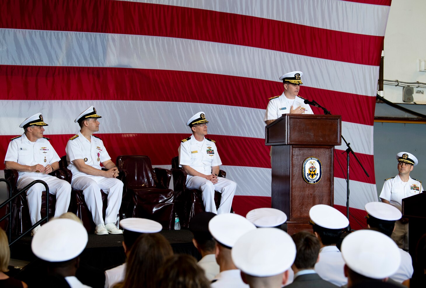 SASEBO, Japan (May 17, 2019) - Rear Adm. Fred Kacher, commander, Expeditionary Strike Group 7, relieves Rear Adm. Bradley Cooper aboard amphibious assault ship USS Wasp (LHD 1) during an Amphibious Force 7th Fleet change of command ceremony held aboard the flagship, May 17.  Commander, Amphibious Force 7th Fleet is the Navy’s only forward-deployed amphibious force, headquartered at White Beach Naval Facility in Okinawa, Japan, and is responsible for the full range of expeditionary operations from disaster relief to crisis response in the U.S. 7th Fleet area of operations.