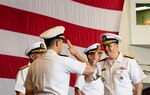 SASEBO, Japan (May 17, 2019) - Rear Adm. Fred Kacher, right, oncoming commander, Expeditionary Strike Group 7, salutes Rear Adm. Bradley Cooper, offgoing commander, ESG 7, aboard amphibious assault ship USS Wasp (LHD 1) during an Amphibious Force 7th Fleet change of command ceremony held aboard the flagship, May 17.  Commander, Amphibious Force 7th Fleet is the Navy’s only forward-deployed amphibious force, headquartered at White Beach Naval Facility in Okinawa, Japan, and is responsible for the full range of expeditionary operations from disaster relief to crisis response in the U.S. 7th Fleet area of operations.