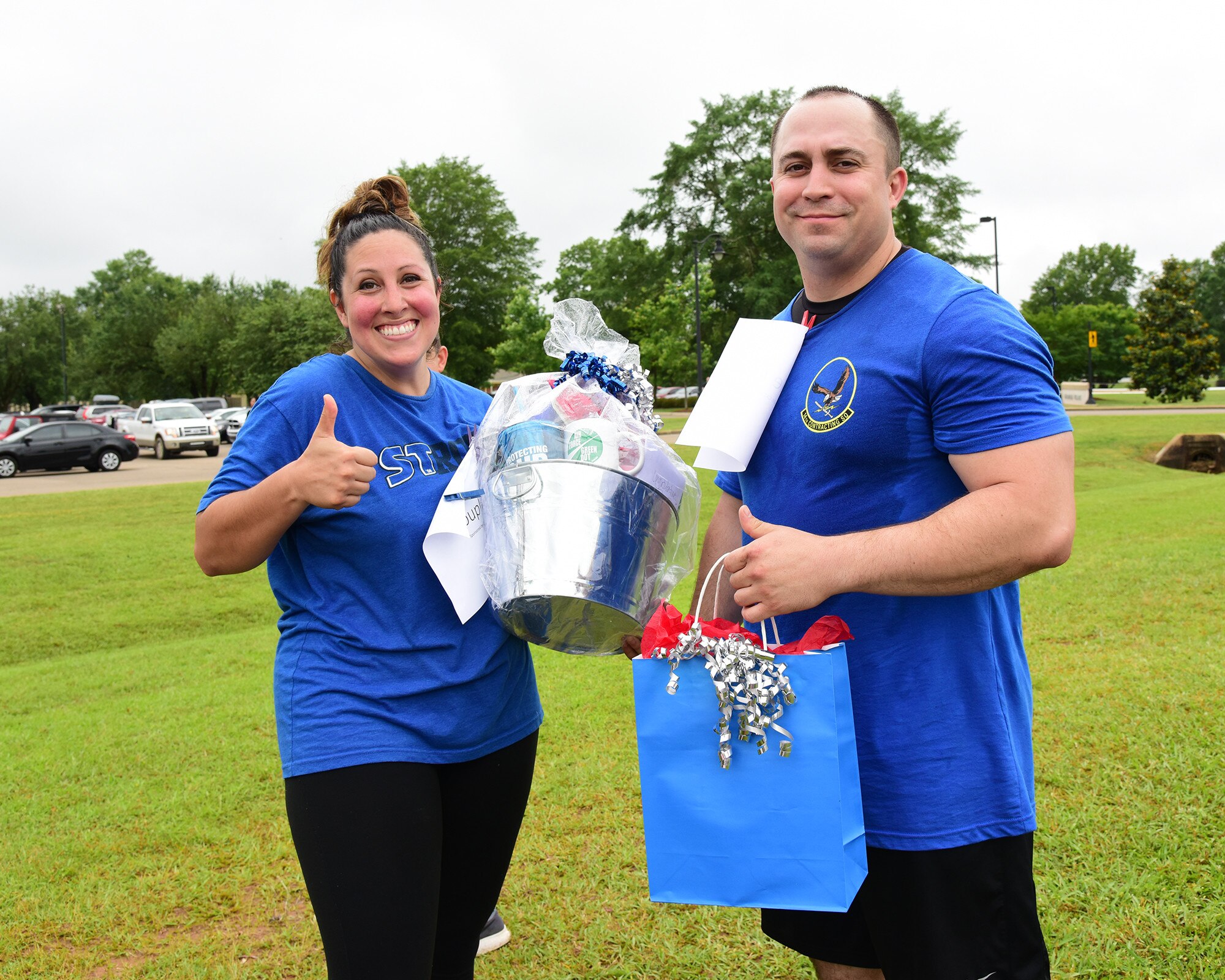 Military spouses participate in various challenges during the Military Spouse Appreciation Day barbeque May 10, 2019, on Columbus Air Force Base, Miss. Similar to the challenges in the international game show, Minute to Win It, spouse groups raced against each other in a competition to see who could complete the challenges in the shortest amount of time. (U.S. Air Force photo by Melissa Doublin)
