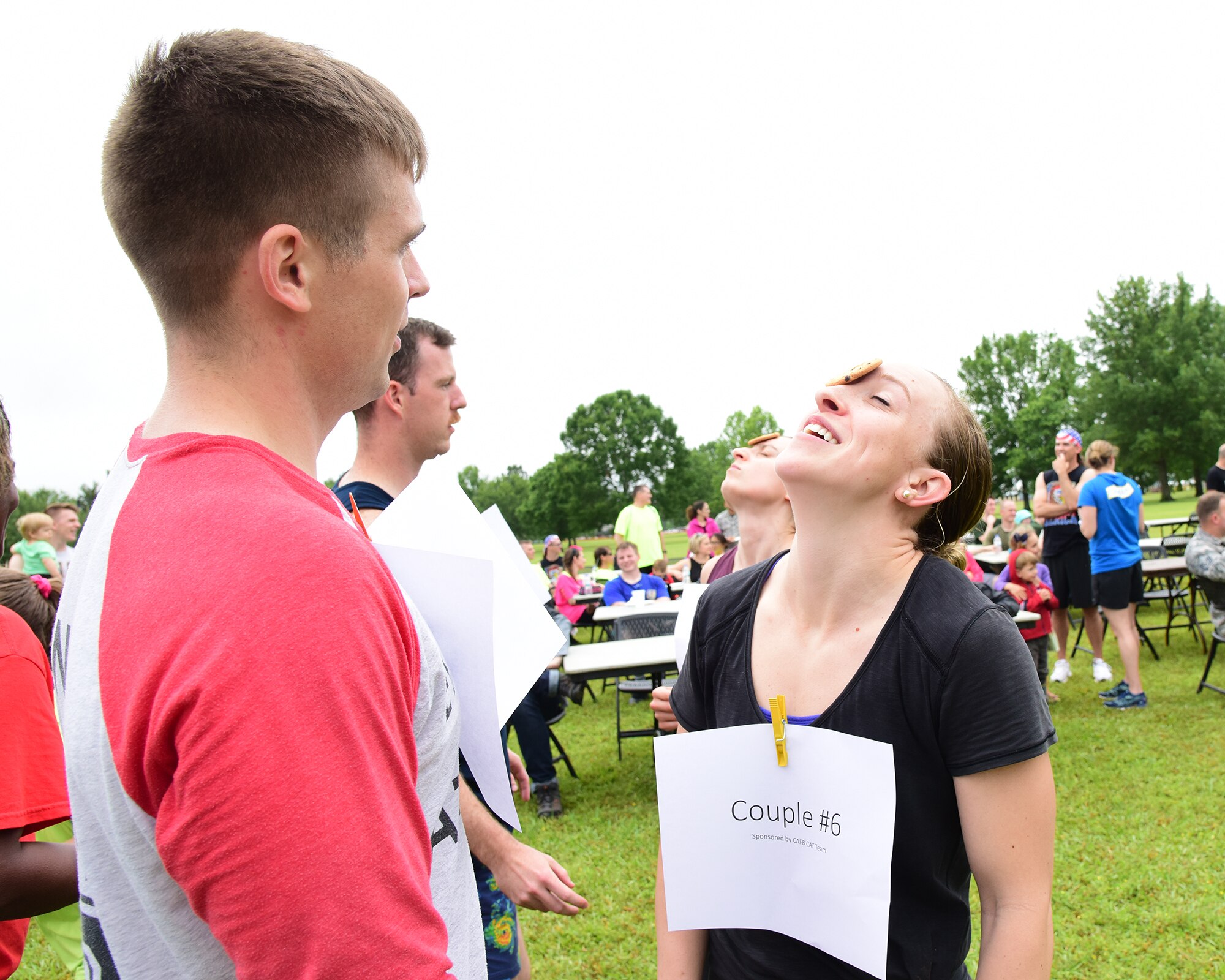 Military spouses participate in various challenges during the Military Spouse Appreciation Day barbeque May 10, 2019, on Columbus Air Force Base, Miss. Similar to the challenges in the international game show, Minute to Win It, spouse groups raced against each other in a competition to see who could complete the challenges in the shortest amount of time. (U.S. Air Force photo by Melissa Doublin)