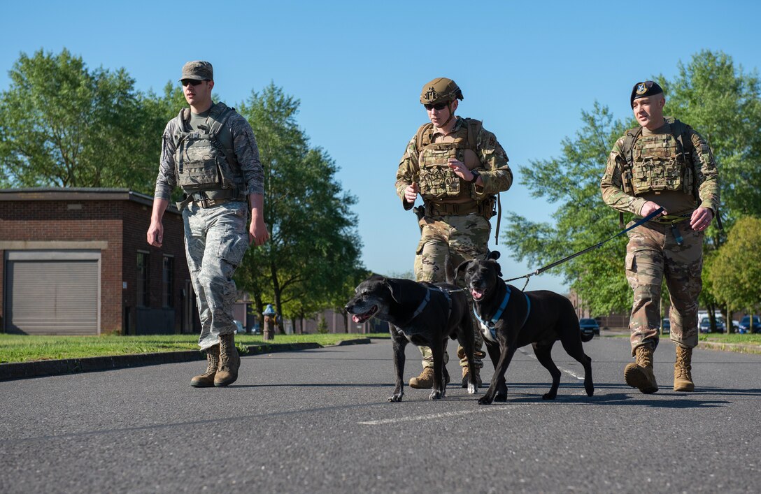 U.S. Air Force members of the 423rd Security Forces Squadron run at the Police Week Kick-Off 5K and Memorial Ruck, May 13, 2019, RAF Alconbury, England. During Police Week law enforcement officers from around the world participate in events to honor those who paid the ultimate sacrifice. (U.S. Air Force photo by Airman 1st Class Jennifer Zima)