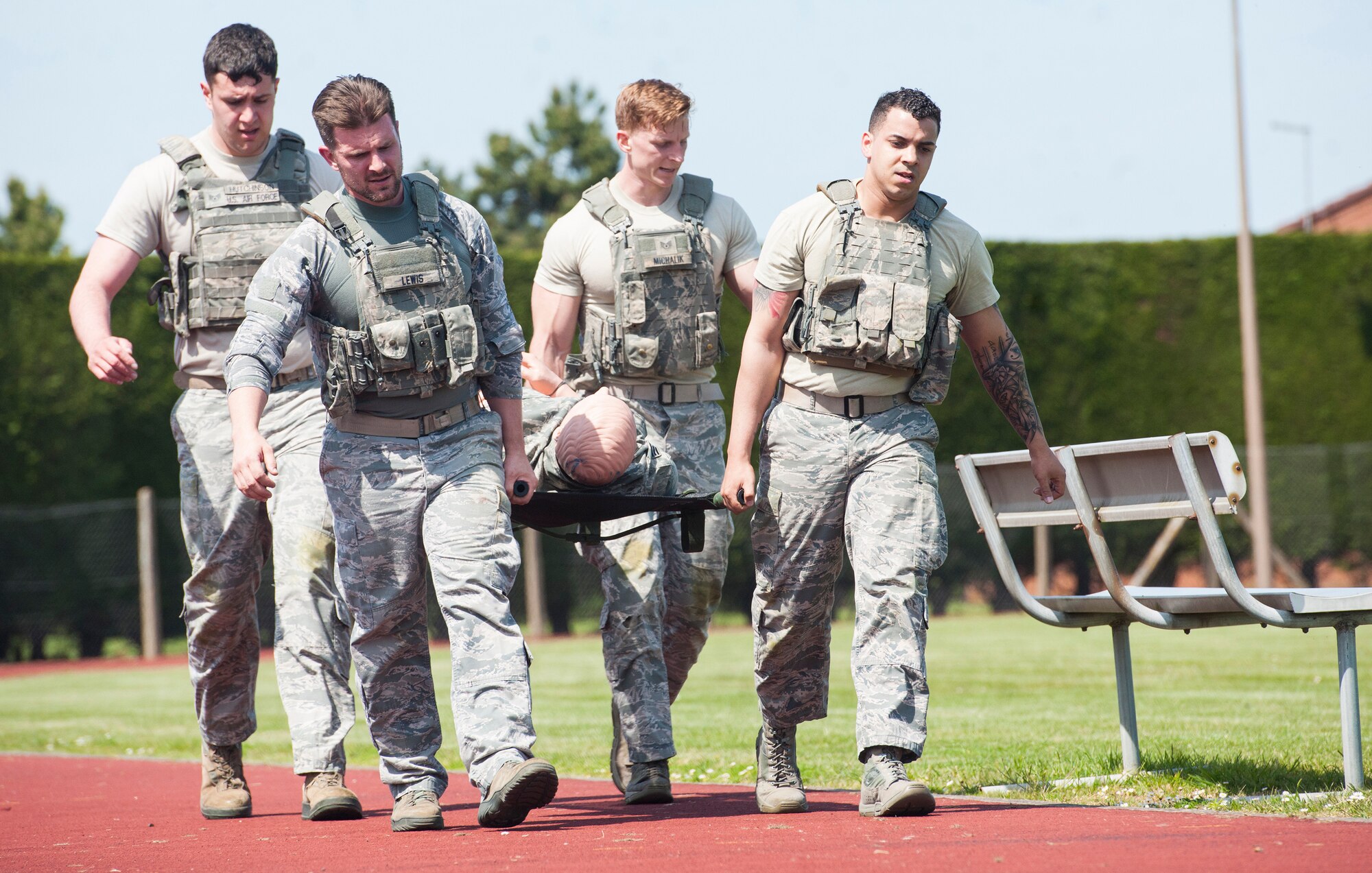 U.S. Air Force Defenders with the 423rd Security Forces Squadron, carry a medical litter during a Police Week Defenders Challenge at RAF Alconbury, England on May 15, 2019. Police Week occurs each year across the peace officer community as a way of remembrance of those that have served in law enforcement and those that paid have the ultimate sacrifice. (U.S. Air Force photo by MSgt. Brian Kimball)