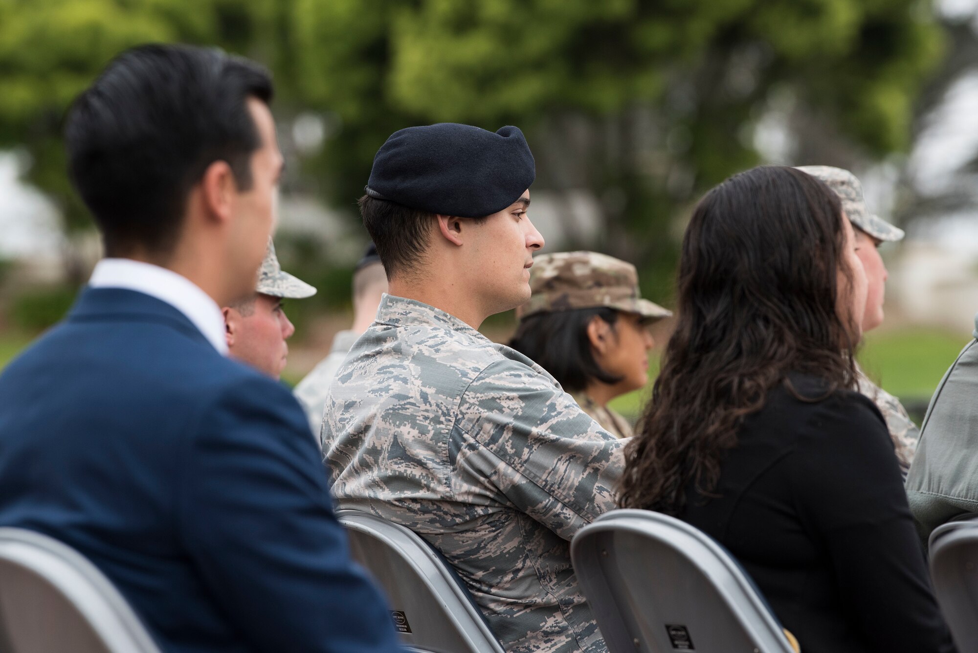 Attendees listen to a speech during the National Police Week opening ceremony, May 13, 2019, Vandenberg Air Force Base, Calif. During the ceremony, the 30th Security Forces Airmen spoke about National Police Week and the events they would be hosting to honor the men and women of law enforcement. (U.S. Air Force photo by Airman 1st Class Hanah Abercrombie)