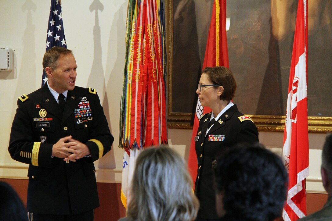 North Atlantic Division (NAD) Commanding General Maj. Gen. Jeffrey Milhorn (left) makes remarks during a retirement ceremony honoring Lt. Col. Julie D'Annunzio (right) at her retirement ceremony held May 10, at the Fort Hamilton Community Club's Washington Room in Brooklyn, New York.