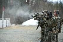 U.S. Marines with 1st Reconnaissance Battalion, 1st Marine Division, Marines with Force Reconnaissance Company, 2nd Reconnaissance Battalion, 2nd Marine Division, and the Norwegian Coastal Ranger Commando (KJK) execute transition drills during exercise Platinum Ren at Fort Trondennes, Harstad, Norway, May 15, 2019.