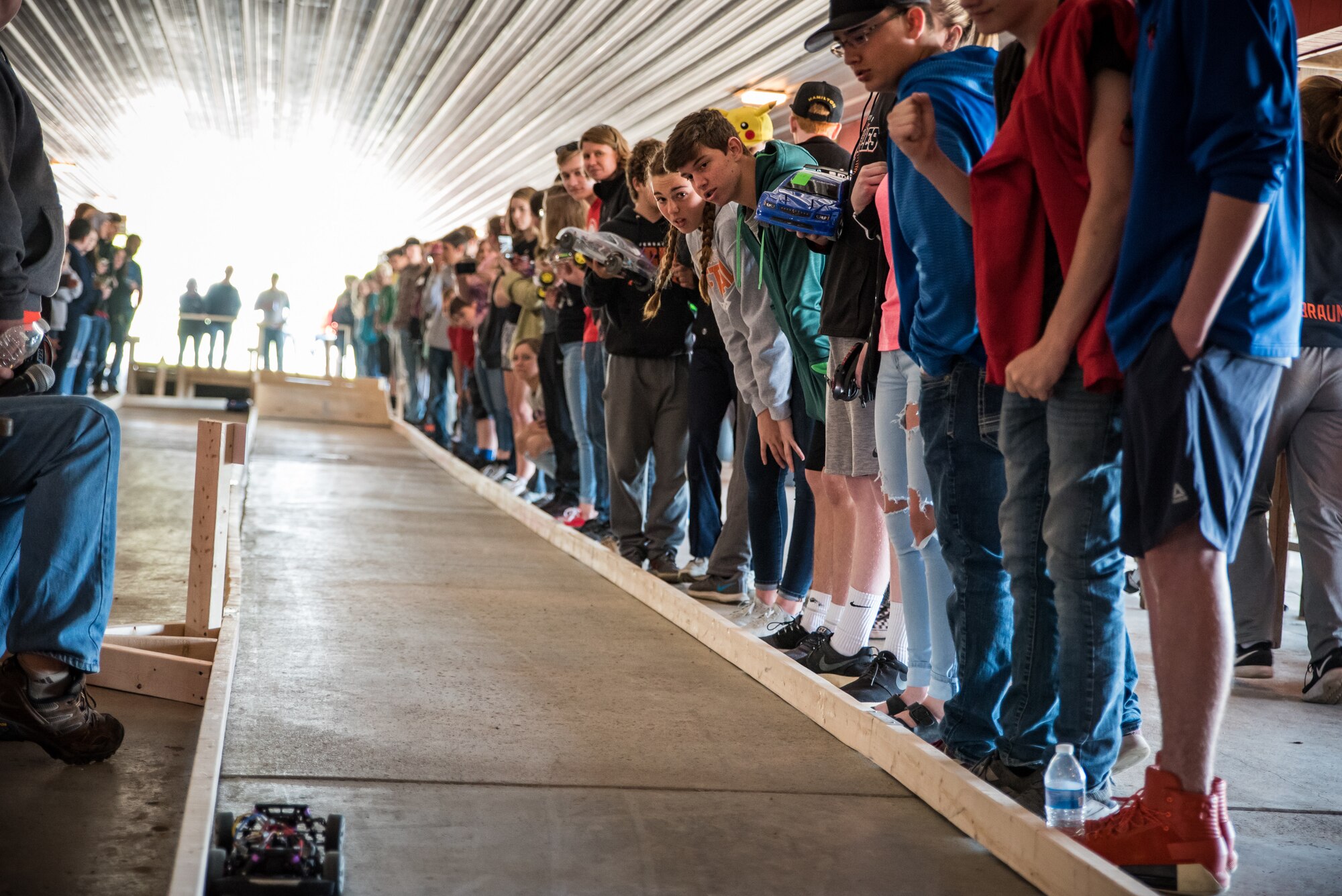 Students from nine local schools watch the remote-controlled car races during the Air Force Research Laboratory’s 7th annual Full Throttle STEM at Eldora Speedway May 14. (U.S. Air Force photo/Richard Eldridge)