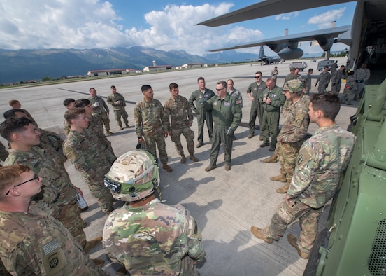 Chief Master Sgt. John Grutzmacher, loadmaster, 96th Airlift Squadron, 934th Airlift Wing, Minneapolis–St. Paul Joint Air Reserve Station, Minnesota, explains loading procedures to soldiers assigned to the 173rd Airborne Brigade Combat Team, during Immediate Response 2019 May 14, 2019, at Aviano Air Base, Italy. The exercise is designed improve readiness and interoperability among participating allied and partner nations. (U.S. Air Force photo by Staff Sgt. Zachary Cacicia)