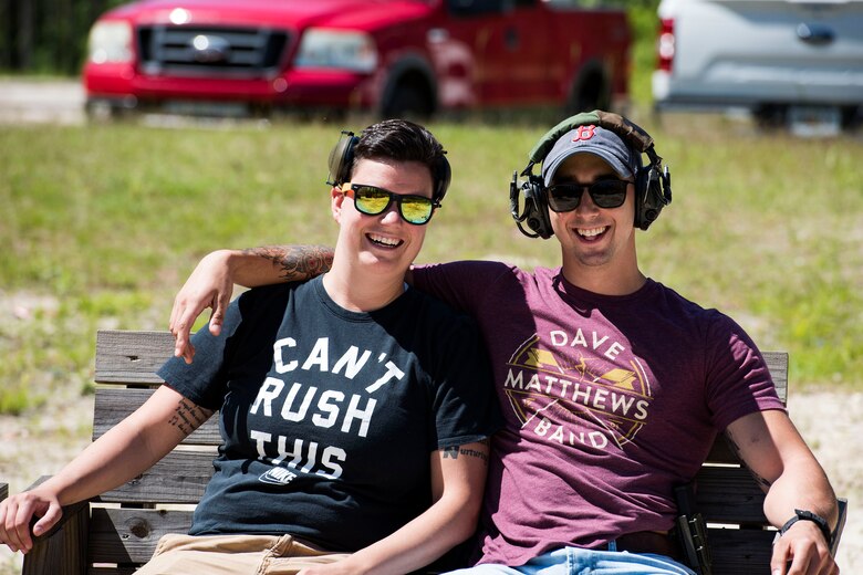 Senior Airman Lacey Dixon, left, 23d Security Forces Squadron (SFS) confinement NCO in charge, and Staff Sgt. Ethan Martin, 23d SFS reports and analysis clerk, pose for a photo during a shooting competition, May 14, 2019, in Valdosta, Ga. The competition was a part of Moody’s support of National Police Week 2019, to pay tribute to all law enforcement officers who serve and protect the united States with courage and dedication. (U.S. Air Force photo by Senior Airman Erick Requadt)