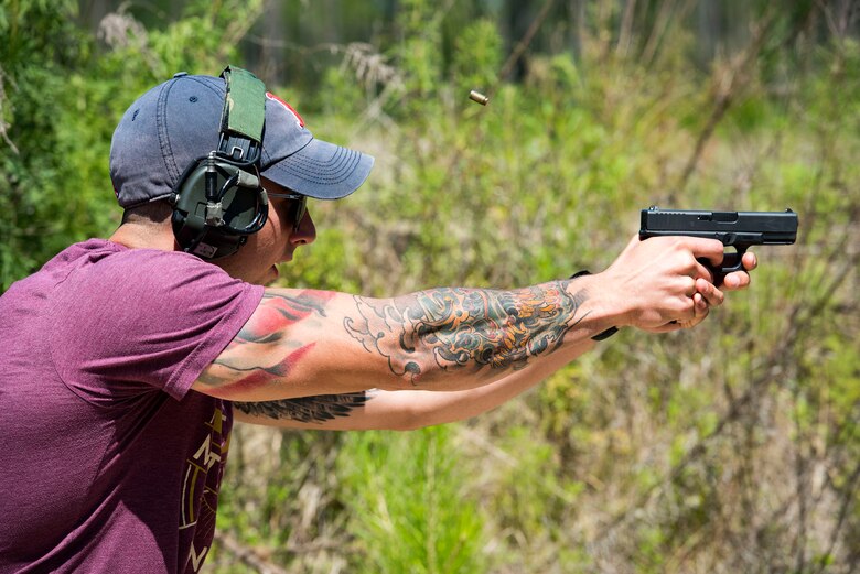 Staff Sgt. Ethan Martin, 23d Security Forces reports and analysis clerk, fires his pistol during a shooting competition, May 14, 2019, in Valdosta, Ga. The competition was a part of Moody’s support of National Police Week 2019, to pay tribute to all law enforcement officers who serve and protect the united States with courage and dedication. (U.S. Air Force photo by Senior Airman Erick Requadt)